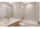 Modern bathroom featuring vanity, toilet, and tiled shower-tub combination at 14370 Hammock Oak St, Parrish, FL 34219