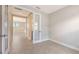 A hallway features glass French doors on both sides and views into other rooms of the house at 14370 Hammock Oak St, Parrish, FL 34219
