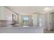 Elegant kitchen showcasing granite countertops, stainless steel appliances, and stylish white cabinets at 14370 Hammock Oak St, Parrish, FL 34219