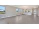 Bright living room features an open floor plan and breakfast bar area at 14370 Hammock Oak St, Parrish, FL 34219