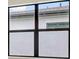 A close up of a window with a view of another building at 14370 Hammock Oak St, Parrish, FL 34219