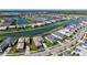 Expansive aerial view of the community and surrounding waterways and landscaping at 4621 Mondrian Ct, Sarasota, FL 34240
