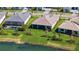 Beautiful view of the lake and green spaces from the home's backyard at 4621 Mondrian Ct, Sarasota, FL 34240