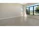 Well lit bedroom with large windows overlooking a lake at 4621 Mondrian Ct, Sarasota, FL 34240