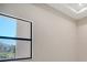 Bedroom with natural light shining through the large window at 4621 Mondrian Ct, Sarasota, FL 34240