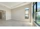 Neutral toned bedroom featuring large windows for plenty of natural light at 4621 Mondrian Ct, Sarasota, FL 34240