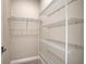 A walk-in closet features wire shelving for ample storage and organization at 4621 Mondrian Ct, Sarasota, FL 34240