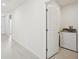 A clean laundry room with a new washer and dryer set and ample space at 31629 Malbec Dr, Brooksville, FL 34602
