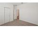 Bedroom with closet and view into the hallway at 466 Sun Chaser Dr, Nokomis, FL 34275