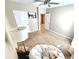 Bedroom featuring a ceiling fan, carpeted floor, neutral walls, and ample natural light at 109 Tierra Verde Way, Bradenton, FL 34212