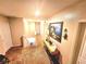 Upstairs hallway with artwork on the wall, neutral colors, and carpeted flooring at 109 Tierra Verde Way, Bradenton, FL 34212