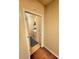 A laundry room visible through an open doorway, showing a washer and dryer at 109 Tierra Verde Way, Bradenton, FL 34212