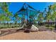 Community playground featuring a rock-climbing wall and slide at 109 Tierra Verde Way, Bradenton, FL 34212