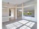 Bright living room boasts an open floor plan and durable, stylish flooring at 14248 Salvatierra Ln, Port Charlotte, FL 33981