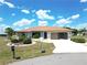 Charming single-story home with a well-maintained lawn, desert landscaping, and inviting curb appeal at 1147 Yachtsman Ln, Punta Gorda, FL 33983
