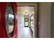 Inviting foyer with a decorative glass front door, neutral walls, and tile flooring, leading into the home at 1147 Yachtsman Ln, Punta Gorda, FL 33983