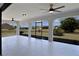 View of the screened lanai with open views to the fenced backyard at 1147 Yachtsman Ln, Punta Gorda, FL 33983