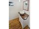 Bathroom featuring unique vanity with wood countertop and vessel sink at 2956 Laurel Ct, Dunedin, FL 34698