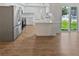 Bright open kitchen with stainless steel appliances and island at 2956 Laurel Ct, Dunedin, FL 34698