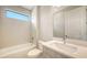 Bathroom featuring a tub and shower combination, modern vanity, and sleek fixtures at 14451 Coastal Woodland Ln, Parrish, FL 34219
