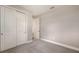 Bedroom featuring plush carpeting and closet with sliding doors at 14451 Coastal Woodland Ln, Parrish, FL 34219