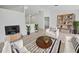 Bright living room with neutral tones, modern furniture, and stylish decor at 3593 Junction St, North Port, FL 34288