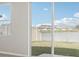 A backyard view with sliding glass doors at 2318 E Newsome Rd, Plant City, FL 33565