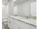 Bathroom with dual sinks and a shower/tub combo at 2318 E Newsome Rd, Plant City, FL 33565