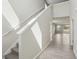 Bright foyer features a staircase, tile flooring and access to the living areas at 2318 E Newsome Rd, Plant City, FL 33565