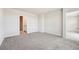 Spacious bedroom showcasing neutral walls and carpeting at 3912 Radiant Mountain Dr, Plant City, FL 33565