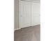 Bedroom with carpet and large closet with paneled sliding doors at 3912 Radiant Mountain Dr, Plant City, FL 33565