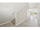 Spacious hallway featuring tile flooring, leading to the living area with backyard views at 3912 Radiant Mountain Dr, Plant City, FL 33565