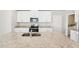 Gourmet kitchen features granite counters, stainless appliances, and center island with sink at 3912 Radiant Mountain Dr, Plant City, FL 33565