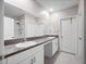 Bathroom featuring double sinks, granite countertops, and modern fixtures at 13327 Willow Bluestar Loop, Riverview, FL 33579