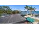 Waterfront property featuring a private pool and beautiful bay views at 103 Shore Dr, Dunedin, FL 34698