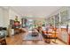 Finished basement with lounge seating, tile flooring, ample sunlight, and views of the backyard at 105 17Th Ne Ave, St Petersburg, FL 33704