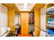 Walk-in closet with custom shelving, hanging rods, drawers, and ample space for storage at 105 17Th Ne Ave, St Petersburg, FL 33704