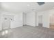Open loft space with neutral carpet and natural light, ideal for flexible living at 1852 Brekey Way, Zephyrhills, FL 33541