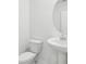 Bathroom featuring a pedestal sink and a toilet at 1867 Draughton Dr, Zephyrhills, FL 33541