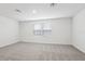 Spacious bedroom with carpet flooring and natural light at 1867 Draughton Dr, Zephyrhills, FL 33541
