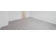 Bright bedroom featuring plush carpeting and a neutral color palette at 1868 Brekey Way, Zephyrhills, FL 33541