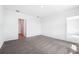 Large bedroom featuring access to other areas of the house at 1876 Brekey Way, Zephyrhills, FL 33541