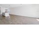 Expansive living space with tile flooring, abundant natural light, and an open layout perfect for entertaining at 1876 Brekey Way, Zephyrhills, FL 33541