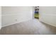 Clean and bright carpeted bedroom offering neutral walls, a window and comfortable space at 14315 Knoll Ridge Dr, Tampa, FL 33625