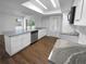 This spacious kitchen offers stainless steel appliances, granite countertops and hardwood floors at 14315 Knoll Ridge Dr, Tampa, FL 33625