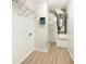 Well-organized utility room featuring shelving and a newer model HVAC system at 14315 Knoll Ridge Dr, Tampa, FL 33625