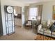 Cozy living space with view to kitchen and ample natural light at 500 The Esplanade N # 405, Venice, FL 34285