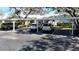 Assigned carport parking in front of the building near the homes at 4215 Edgewood Dr, Holiday, FL 34691