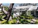 Well-maintained single-story home with lovely landscaping, shrubs and walkway at 4215 Edgewood Dr, Holiday, FL 34691