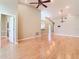 Bright and airy living room with hardwood floors, high ceilings, and modern finishes at 4215 Edgewood Dr, Holiday, FL 34691